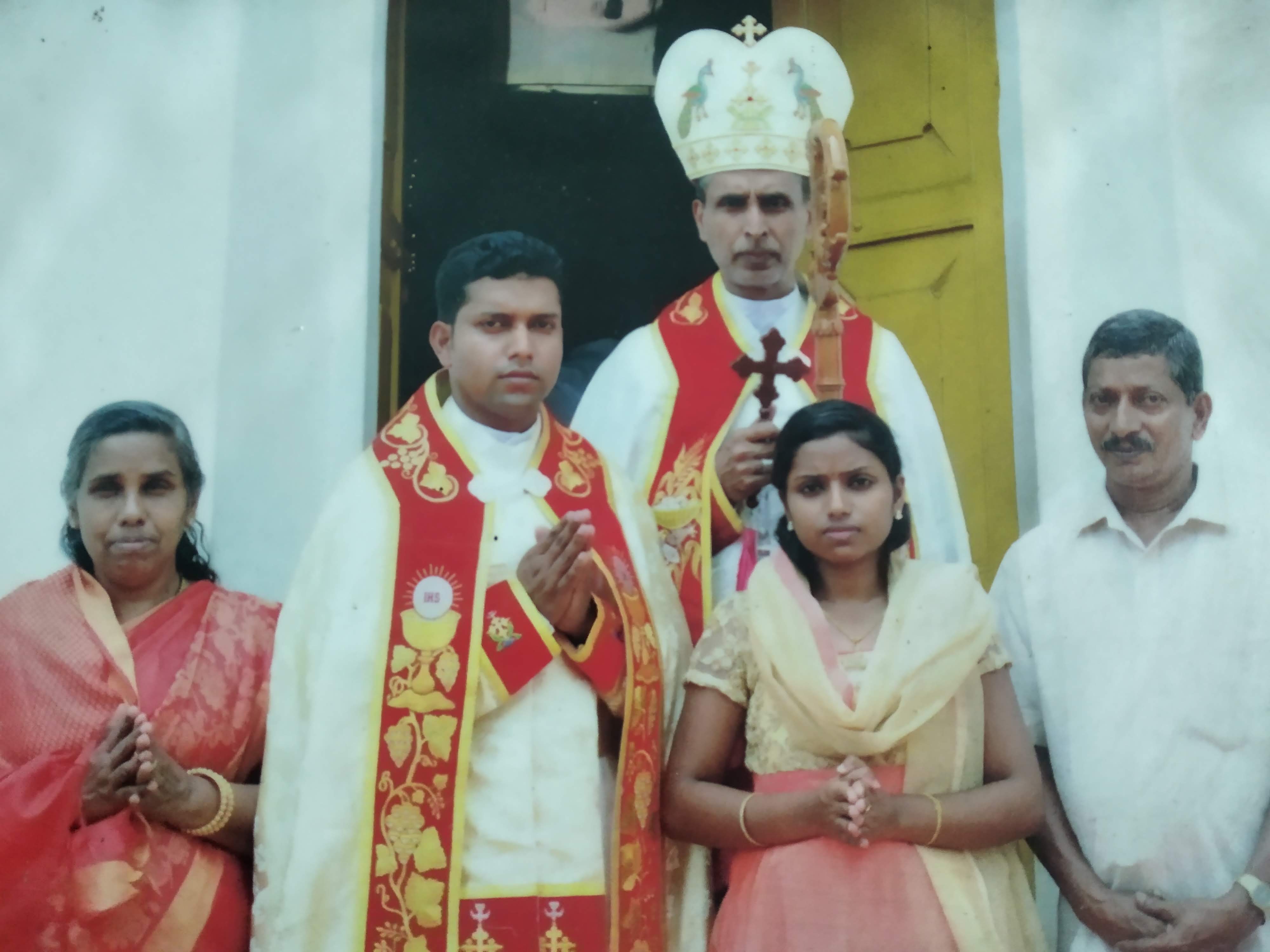 Indian Bishop and Indian Priest and his family