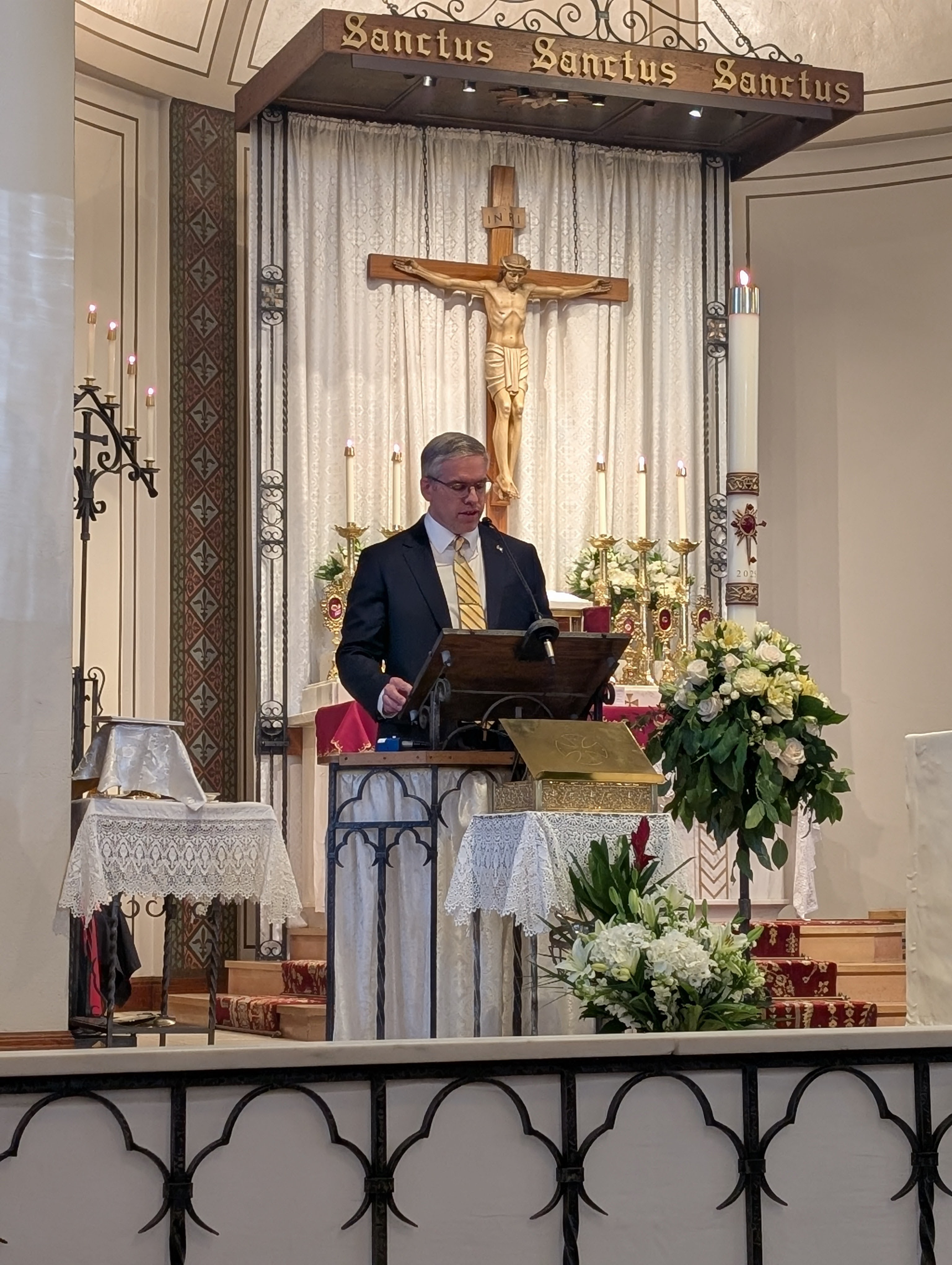man lectoring in church