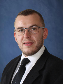 man in suit headshot