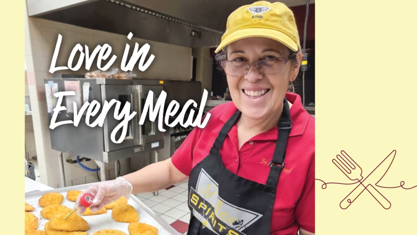 Luncg lady holding tray of food