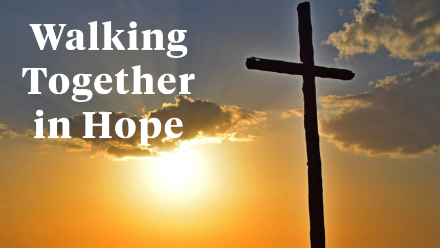 cross in pastoral background