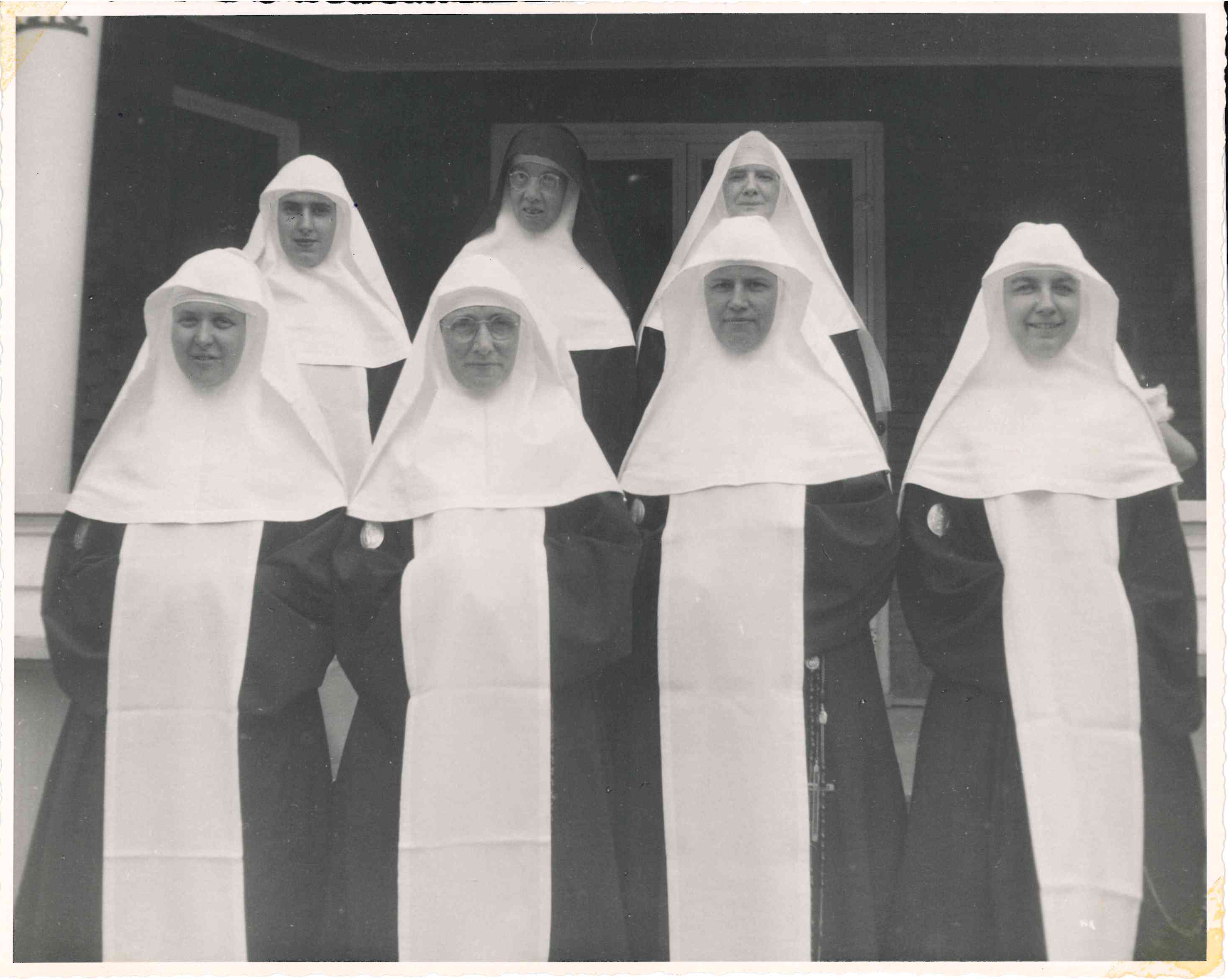 black and white group of nuns
