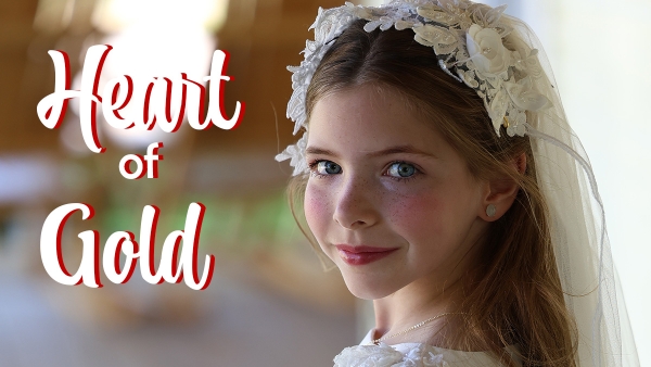 little girl wearing white veil