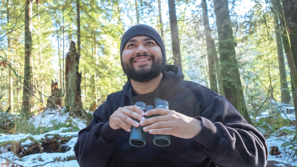 man with binoculars